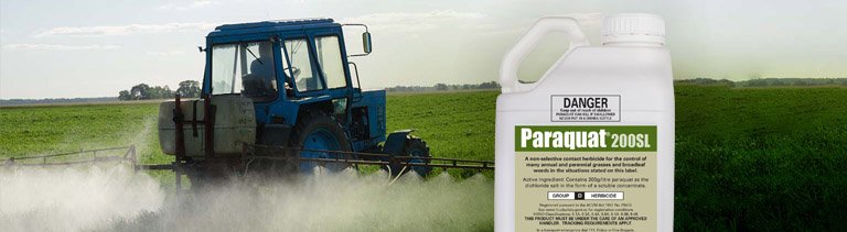 A tractor spraying paraquat